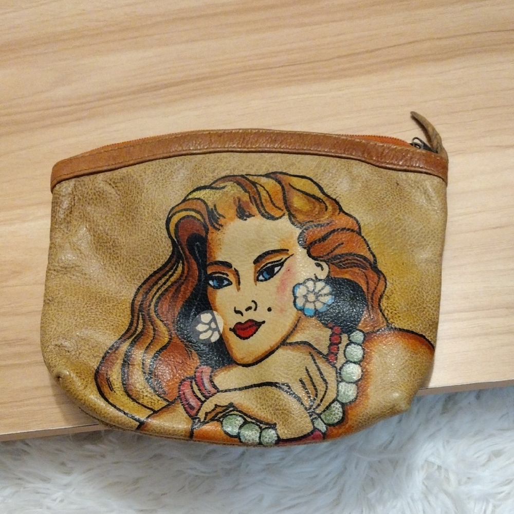 Handcrafted Tan Leather Pouch with Artistic Design